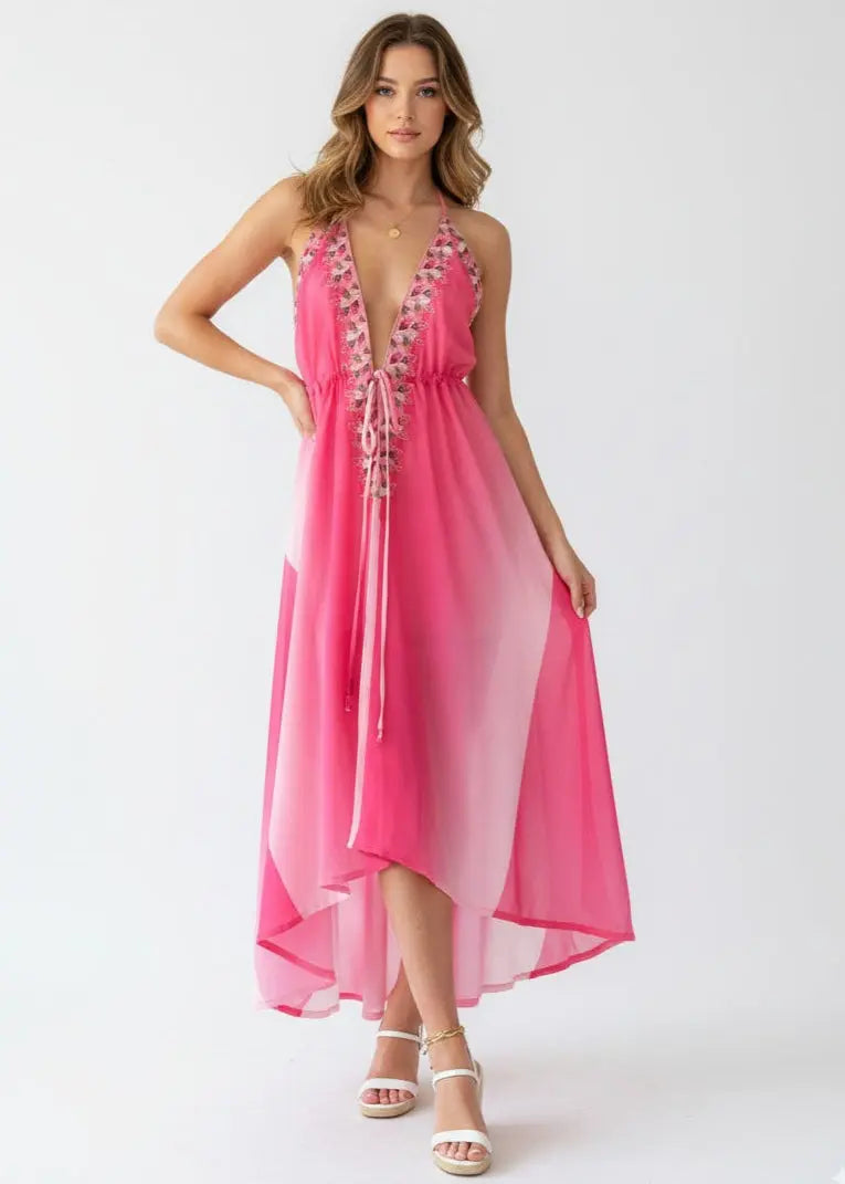 Model wearing the pink Flamingo halter neck long dress