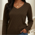 Front view of the brown V-neck sweater in natural light. Model wearing brown lightweight cardigan sweaters with V-neck design.