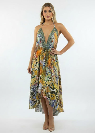 Woman wearing a floral dress on a white background