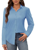 Woman wearing a light blue button-up shirt and jeans on a white background